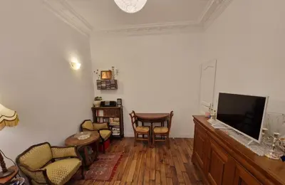 Télévision ou salle de divertissement dans l'établissement Appartement 2 pièces à Auteuil