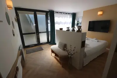 Un ou plusieurs lits dans un hébergement de l'établissement Cocon neuf & cosy - A deux pas de Bercy