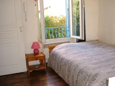 Un ou plusieurs lits dans un hébergement de l'établissement Le Jardin de Cécile et Benoit - Bed and Breakfast