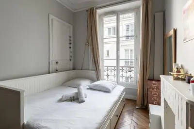 Un ou plusieurs lits dans un hébergement de l'établissement Appartement Palido - Welkeys