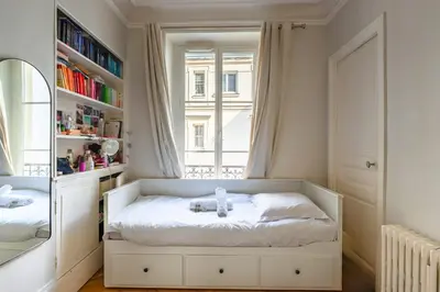 Un ou plusieurs lits dans un hébergement de l'établissement Appartement Palido - Welkeys