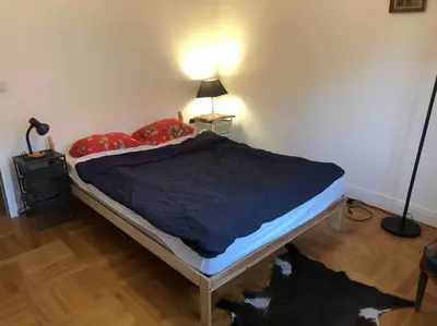 Un ou plusieurs lits dans un hébergement de l'établissement Grand appartement proche métro