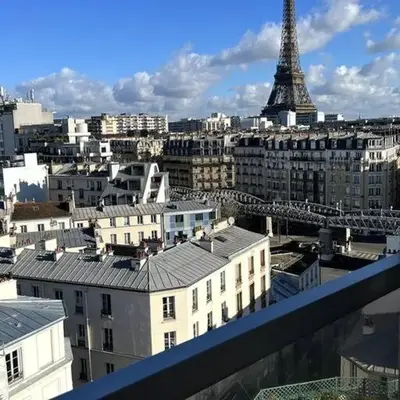 Tour Eiffel - Studio vue imprenable au-dessus des toits