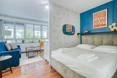Un ou plusieurs lits dans un hébergement de l'établissement Apartment 4Pers - Montparnasse/St Germain