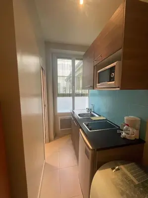 Cuisine ou kitchenette dans l'établissement studio 75012