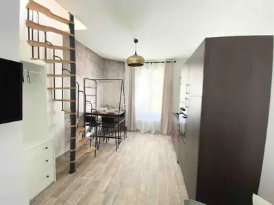 Télévision ou salle de divertissement dans l'établissement Appartement Esprit Industriel