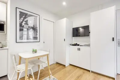 Cuisine ou kitchenette dans l'établissement Le Balcon de l'Opéra I Studio Cozy