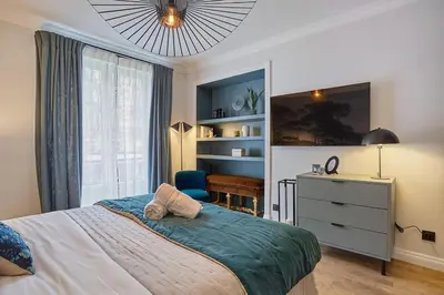 Un ou plusieurs lits dans un hébergement de l'établissement Apartment Notre Dame de Paris by Studio prestige