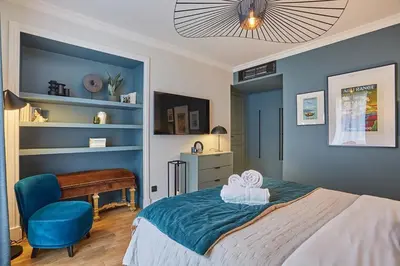 Un ou plusieurs lits dans un hébergement de l'établissement Apartment Notre Dame de Paris by Studio prestige