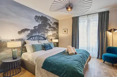 Un ou plusieurs lits dans un hébergement de l'établissement Apartment Notre Dame de Paris by Studio prestige