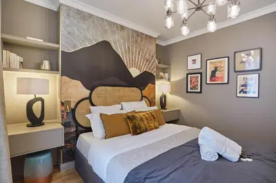 Un ou plusieurs lits dans un hébergement de l'établissement Apartment Notre Dame de Paris by Studio prestige