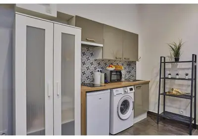 Cuisine ou kitchenette dans l'établissement Studio Center of Paris Montmartre by Studio prestige