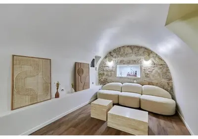 Coin salon dans l'établissement Apartment Le Marais place des Vosges by Studio prestige
