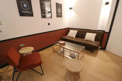 Coin salon dans l'établissement Neuf & Cosy - 2 chambres - 11e