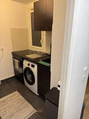 Cuisine ou kitchenette dans l'établissement The Signature Suite