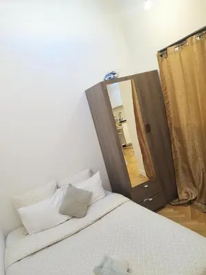 Un ou plusieurs lits dans un hébergement de l'établissement APT 2 chambres idéal professionnel à 5 minutes de Metro