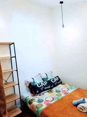Un ou plusieurs lits dans un hébergement de l'établissement APT 2 chambres idéal professionnel à 5 minutes de Metro