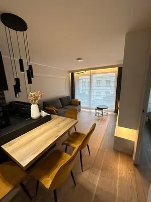 Coin salon dans l'établissement Elegant Apartment Minutes from Paris