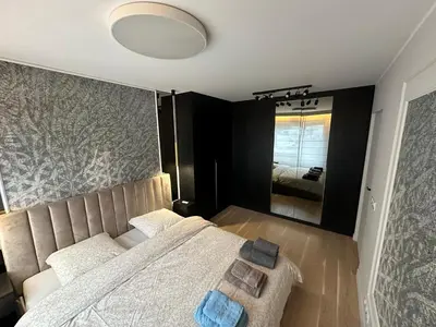 Un ou plusieurs lits dans un hébergement de l'établissement Elegant Apartment Minutes from Paris