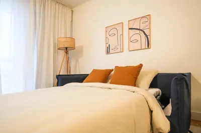 Un ou plusieurs lits dans un hébergement de l'établissement Apartment Paris 15