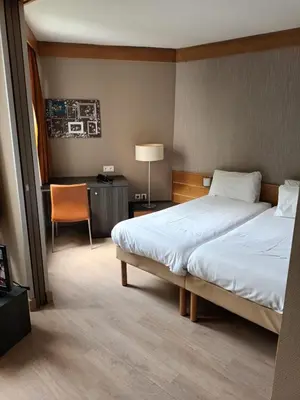 Un ou plusieurs lits dans un hébergement de l'établissement Paris XV Multire - Aparthotel 4 guests