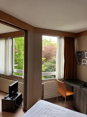 Un ou plusieurs lits dans un hébergement de l'établissement Paris XV Multire - Aparthotel 4 guests