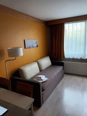 Coin salon dans l'établissement Paris XV Multire - Aparthotel 4 guests