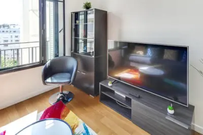 Télévision ou salle de divertissement dans l'établissement Appartement Garros - Welkeys