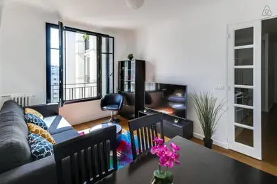 Coin salon dans l'établissement Appartement Garros - Welkeys