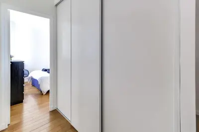 Un ou plusieurs lits dans un hébergement de l'établissement Appartement Garros - Welkeys