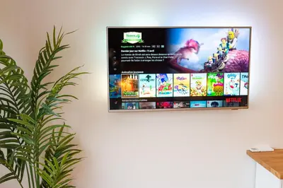 Télévision ou salle de divertissement dans l'établissement Studio Delorme