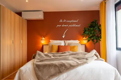 Un ou plusieurs lits dans un hébergement de l'établissement Studio Delorme
