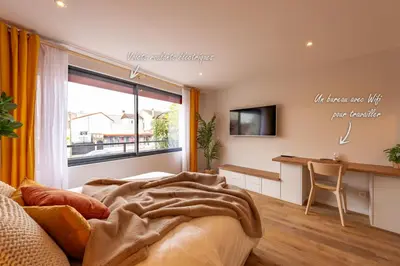 Télévision ou salle de divertissement dans l'établissement Studio Delorme
