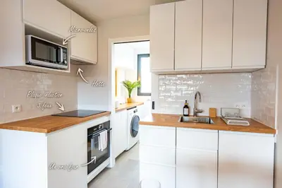 Cuisine ou kitchenette dans l'établissement Studio Eiffel