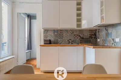 Cuisine ou kitchenette dans l'établissement R'Apparts T3 Paris 9ème L'Incontournable