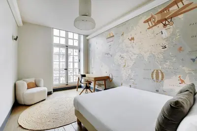 Un ou plusieurs lits dans un hébergement de l'établissement Villa Bastille with Services by Pick A Flat