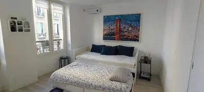 Un ou plusieurs lits dans un hébergement de l'établissement Appartement paisible