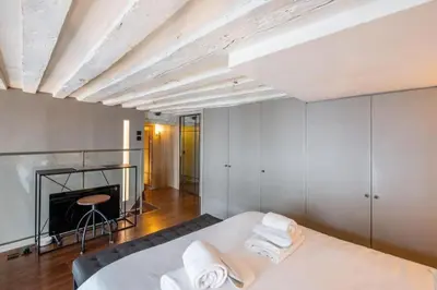 Un ou plusieurs lits dans un hébergement de l'établissement Paris 1er - Magnifique duplex