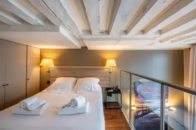 Un ou plusieurs lits dans un hébergement de l'établissement Paris 1er - Magnifique duplex