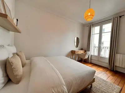 Un ou plusieurs lits dans un hébergement de l'établissement Apartment 1 Bedroom # Paris 14 # Alesia