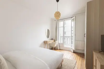Un ou plusieurs lits dans un hébergement de l'établissement Apartment 1 Bedroom # Paris 14 # Alesia