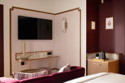 Télévision ou salle de divertissement dans l'établissement Hôtel Filigrane & Spa