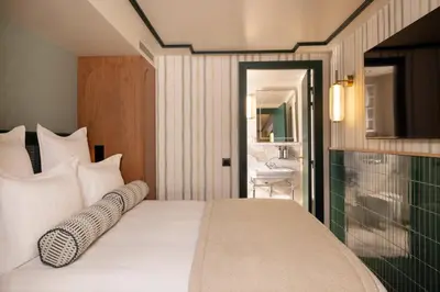 Un ou plusieurs lits dans un hébergement de l'établissement Hôtel Filigrane & Spa