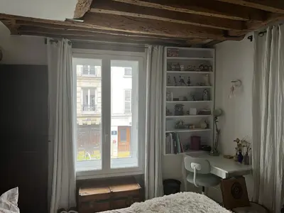 Un ou plusieurs lits dans un hébergement de l'établissement Deux chambres en plein cœur de Montmartre, Paris
