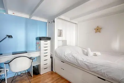 Un ou plusieurs lits dans un hébergement de l'établissement Studio Loft des Combes - Welkeys