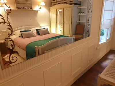 Un ou plusieurs lits dans un hébergement de l'établissement Appartement haussmannien cosy
