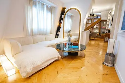 Un ou plusieurs lits dans un hébergement de l'établissement Luxueuse suite