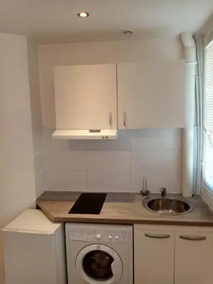Cuisine ou kitchenette dans l'établissement Joli