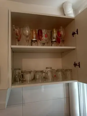 Cuisine ou kitchenette dans l'établissement Joli