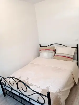 Un ou plusieurs lits dans un hébergement de l'établissement Joli